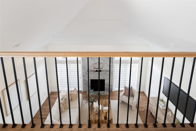 staircase featuring vaulted ceiling