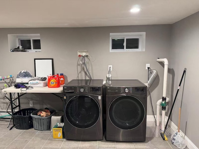 washroom with tile patterned flooring, recessed lighting, laundry area, baseboards, and washer and dryer