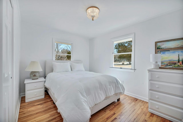 4645 Rocky Point Rd, East Marion, NY 11939 - bedroom featuring light wood-style floors and baseboards