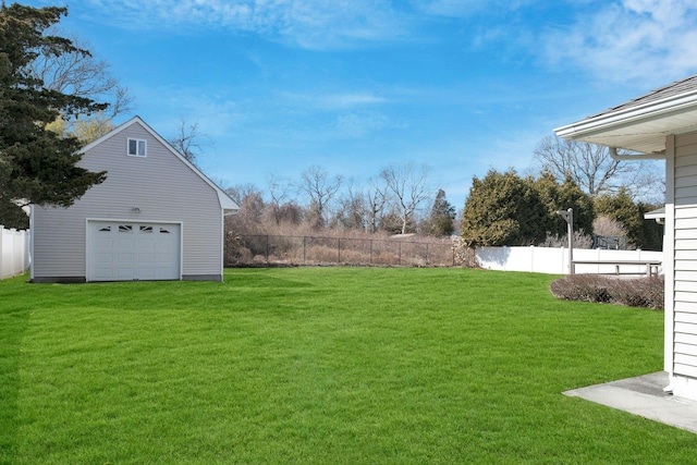 4645 Rocky Point Rd, East Marion, NY 11939 - view of yard featuring a detached garage and an outbuilding