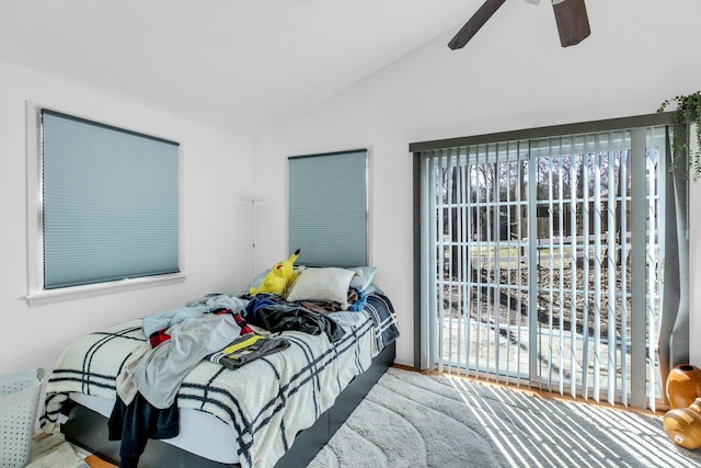 bedroom featuring ceiling fan and vaulted ceiling