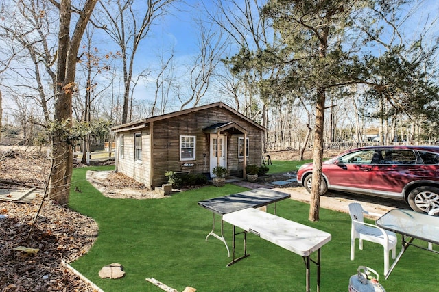 exterior space with a front yard