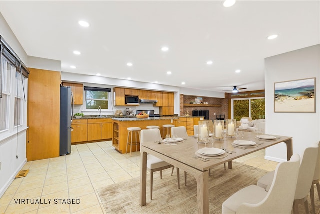 dining area featuring recessed lighting, visible vents, and light tile patterned floors