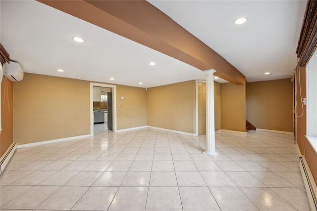 finished below grade area with light tile patterned floors, baseboards, a wall mounted air conditioner, recessed lighting, and a baseboard heating unit