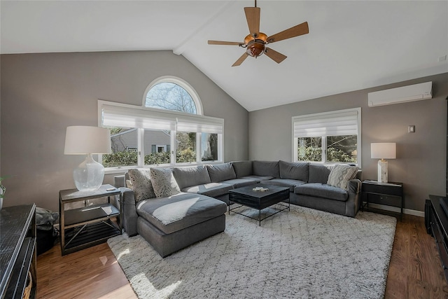 living area with ceiling fan, high vaulted ceiling, wood finished floors, and a wall mounted AC