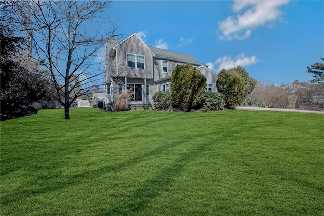 view of front of house with a front lawn