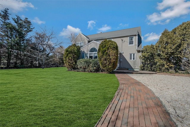 view of front of home with a front yard