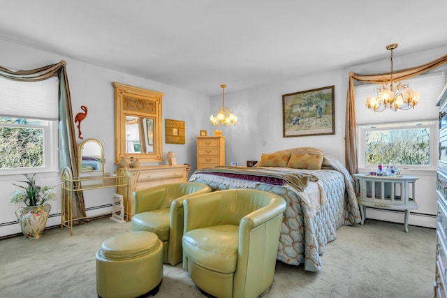 bedroom with a baseboard radiator, carpet flooring, and a notable chandelier