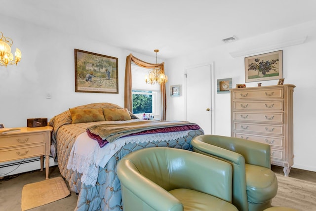 bedroom with a chandelier, a baseboard radiator, and visible vents