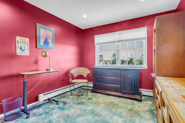 living area with carpet floors, a baseboard radiator, and baseboards