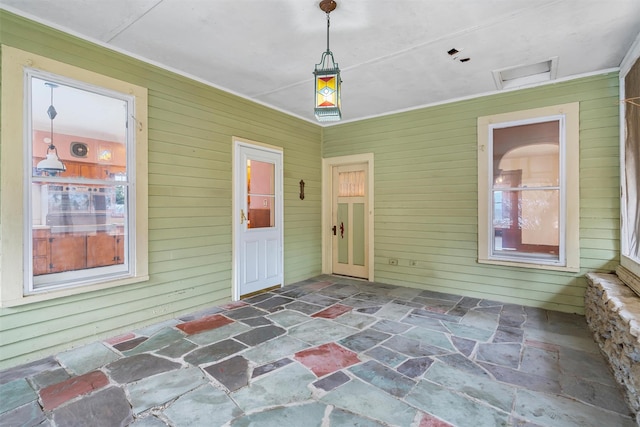 view of unfurnished sunroom