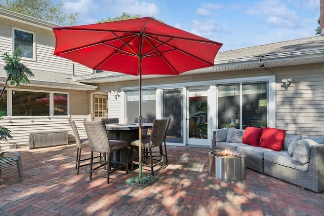 view of patio with outdoor lounge area and outdoor dining space