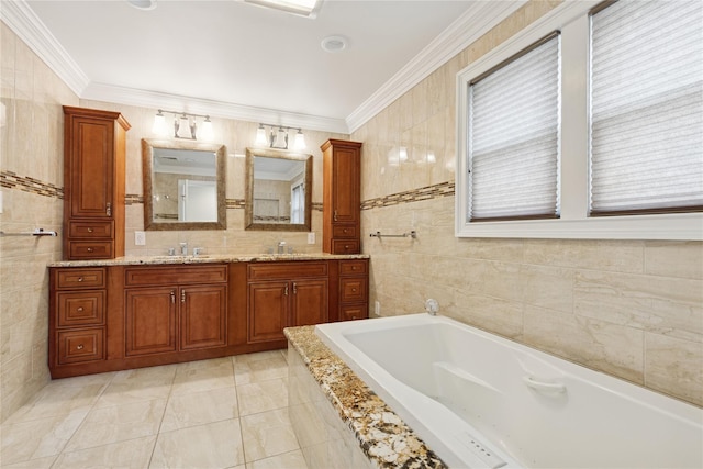 bathroom with a garden tub, a sink, tile walls, and crown molding