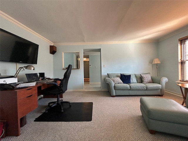 carpeted office featuring baseboards and crown molding