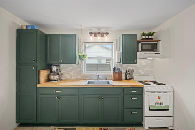 kitchen featuring extractor fan, a sink, and green cabinetry