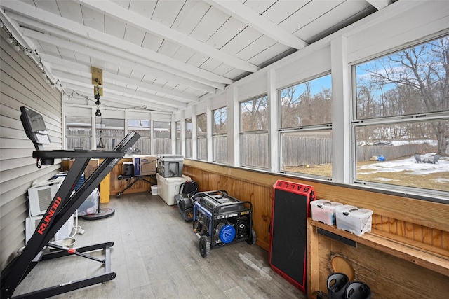 sunroom / solarium with vaulted ceiling with beams and wood ceiling