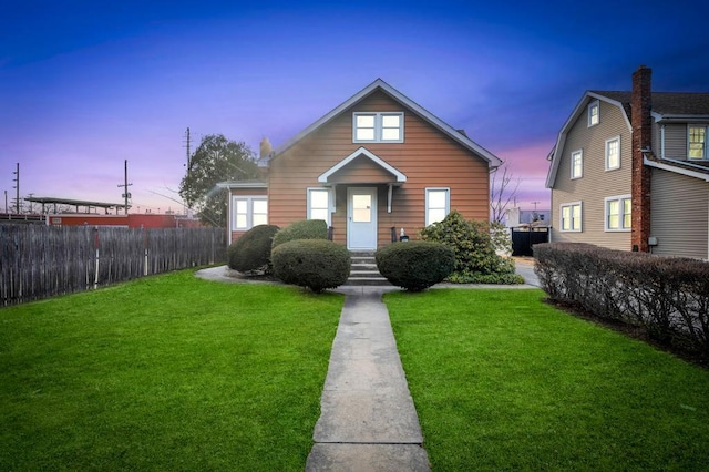 2152 Milburn Ave, Baldwin, NY 11510 - bungalow featuring a front yard and fence