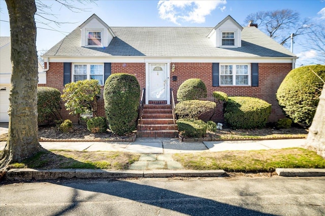 view of front of home with brick siding