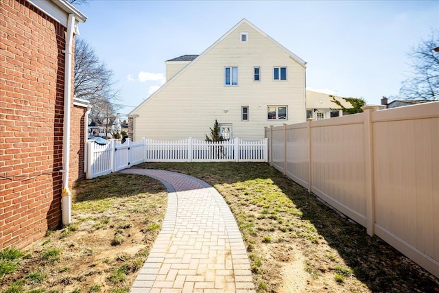 view of yard featuring a fenced backyard