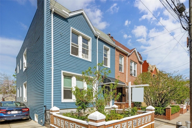 3709 20th Rd, Astoria, NY 11105 - view of front facade featuring a chimney
