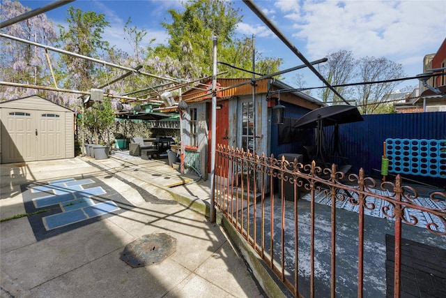 3709 20th Rd, Astoria, NY 11105 - view of patio / terrace with an outdoor structure and a shed