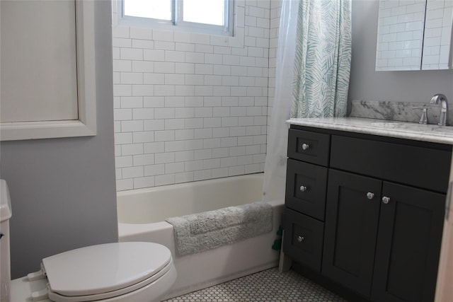 full bath featuring tile patterned flooring, vanity, toilet, and shower / tub combo with curtain