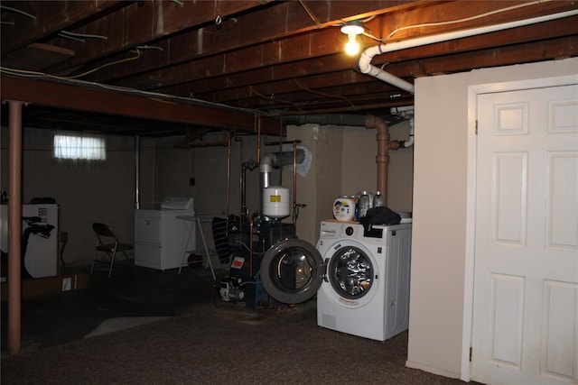 basement featuring washing machine and dryer