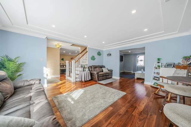 living room featuring recessed lighting, stairway, ornamental molding, wood finished floors, and baseboards