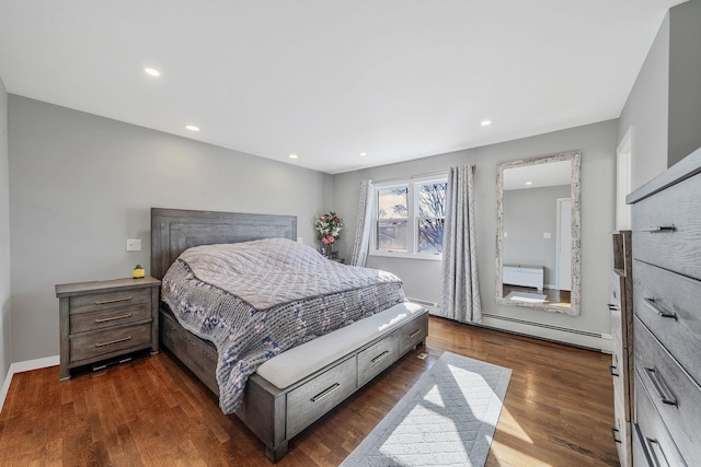 bedroom with a baseboard heating unit, recessed lighting, dark wood-style flooring, and baseboards