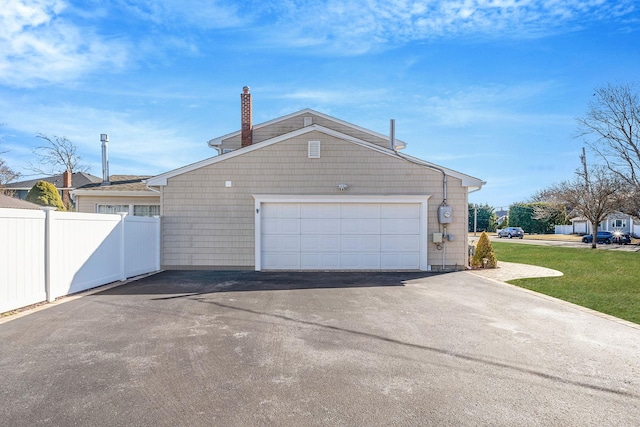 garage featuring fence