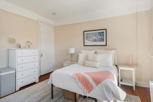 bedroom with wood finished floors