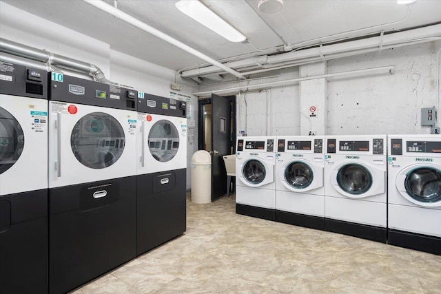 common laundry area with washer and dryer