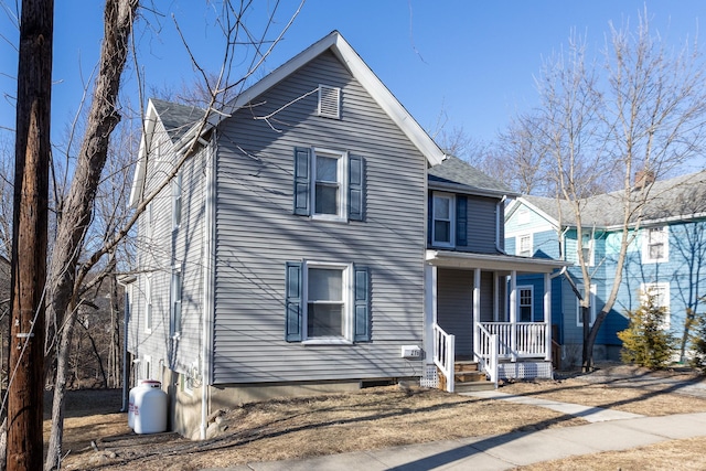 view of front of property featuring covered porch