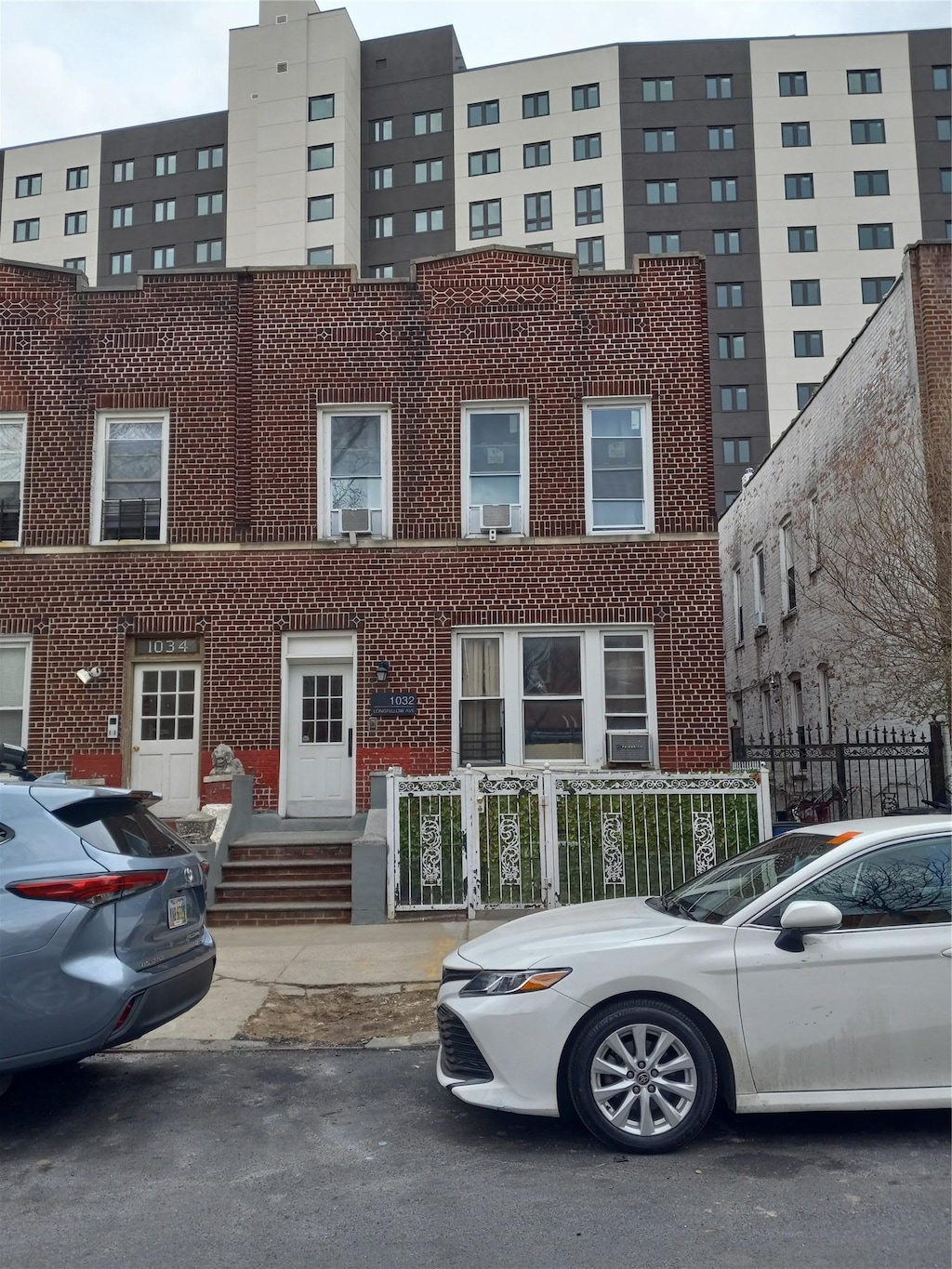 view of building exterior featuring a fenced front yard