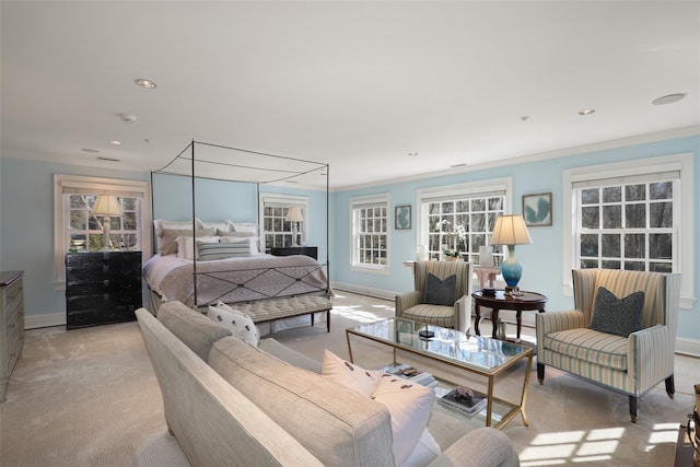 bedroom featuring light carpet, baseboards, ornamental molding, and recessed lighting