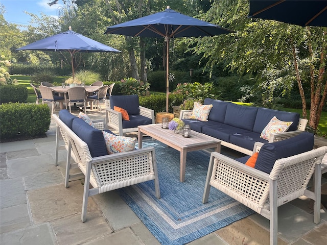 view of patio / terrace featuring outdoor dining area and outdoor lounge area