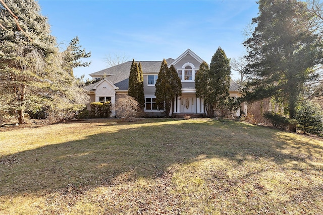 view of front of home with a front lawn