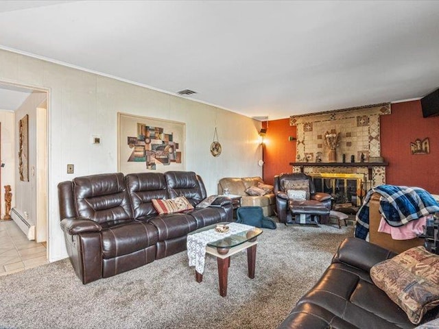 living room with carpet, a brick fireplace, visible vents, and baseboard heating