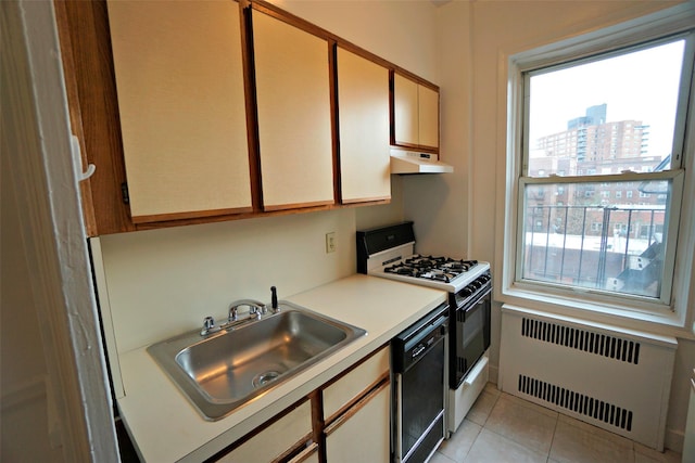 kitchen with black dishwasher, range with gas stovetop, radiator heating unit, under cabinet range hood, and a sink