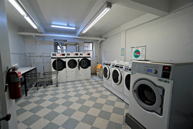 shared laundry area with washing machine and dryer