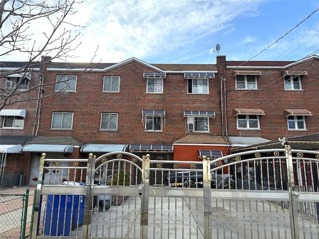 view of property featuring a fenced front yard