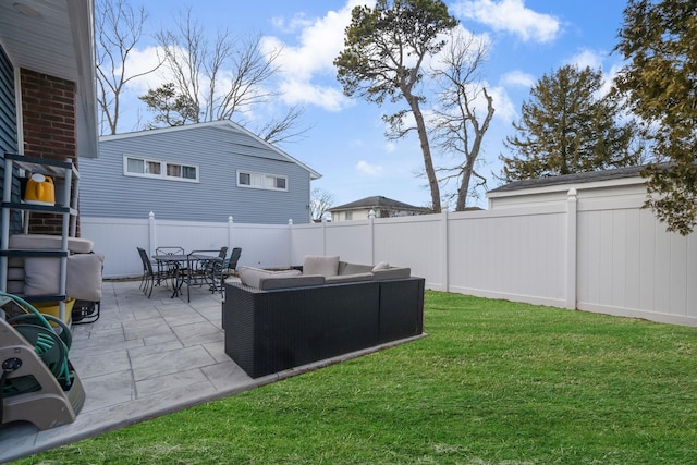 view of yard featuring outdoor dining space, a fenced backyard, a patio, and an outdoor living space