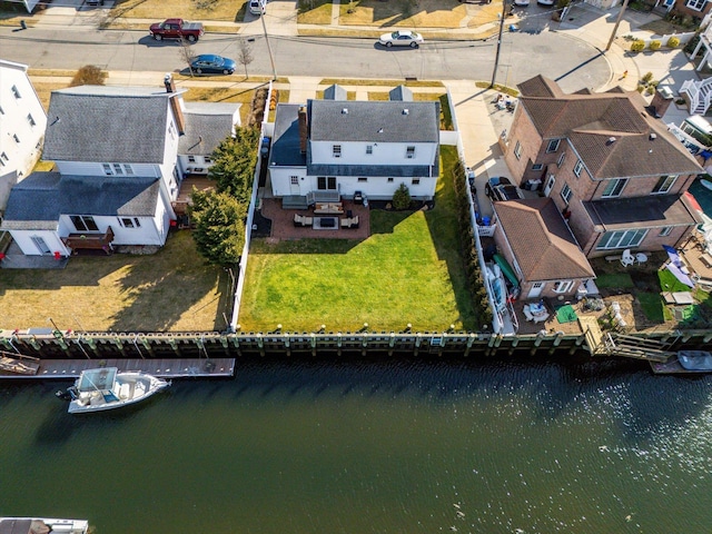 aerial view featuring a residential view and a water view