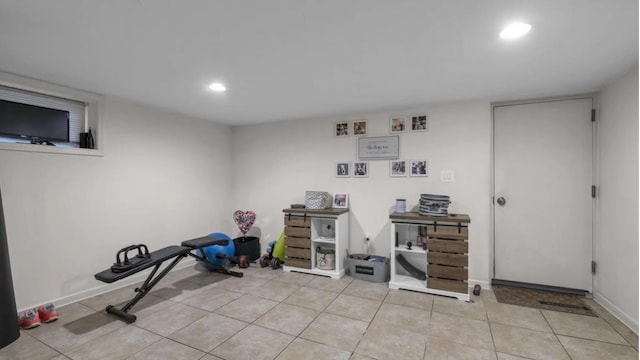 workout area with baseboards, recessed lighting, and tile patterned floors