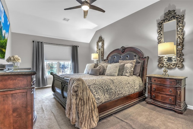 bedroom featuring carpet floors, lofted ceiling, visible vents, and baseboards