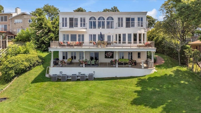 back of house with a patio, a lawn, and central air condition unit