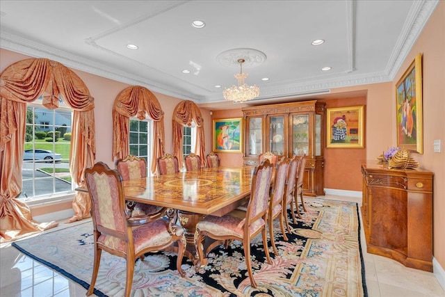 dining space with baseboards, ornamental molding, light tile patterned floors, and a notable chandelier