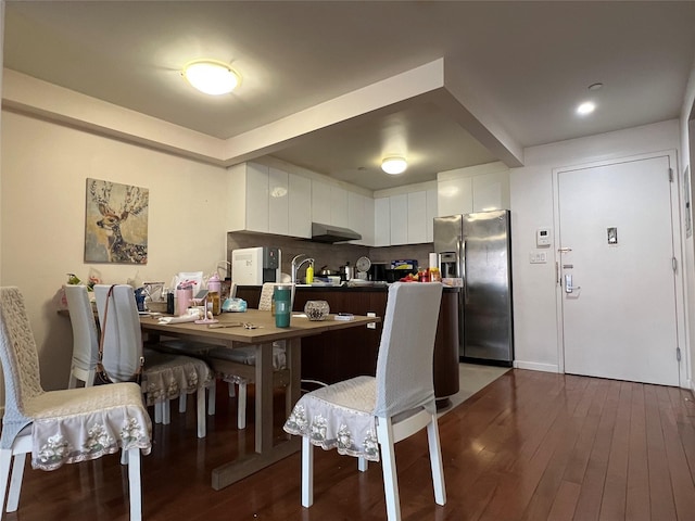 dining room featuring dark wood-type flooring