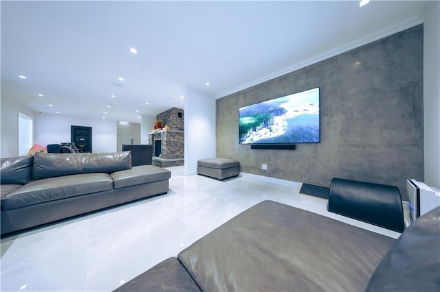 living room with an accent wall, a stone fireplace, concrete flooring, crown molding, and recessed lighting