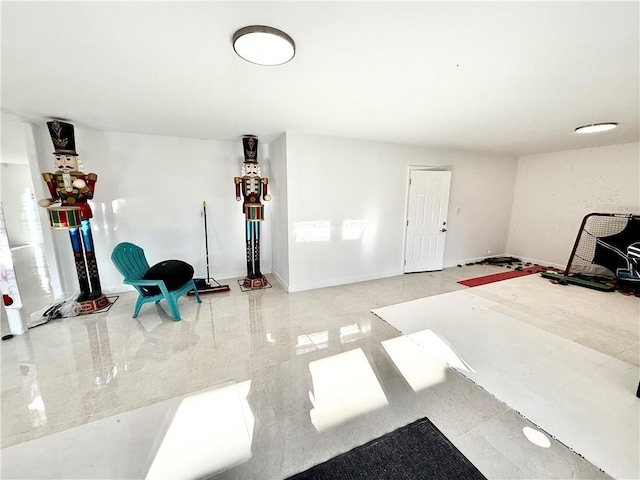 garage featuring baseboards